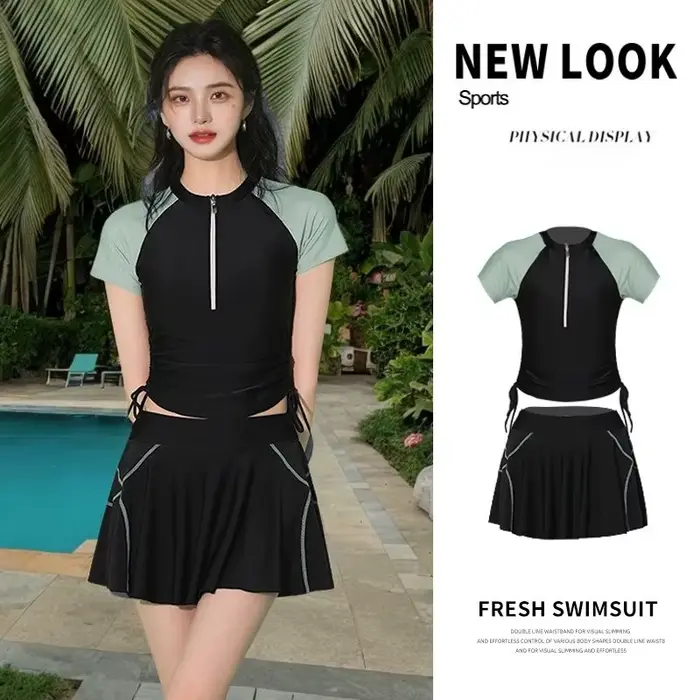 Ensemble de maillot de bain athlétique deux pièces avec haut à manches courtes à demi-zip et jupe froncée à nouer sur